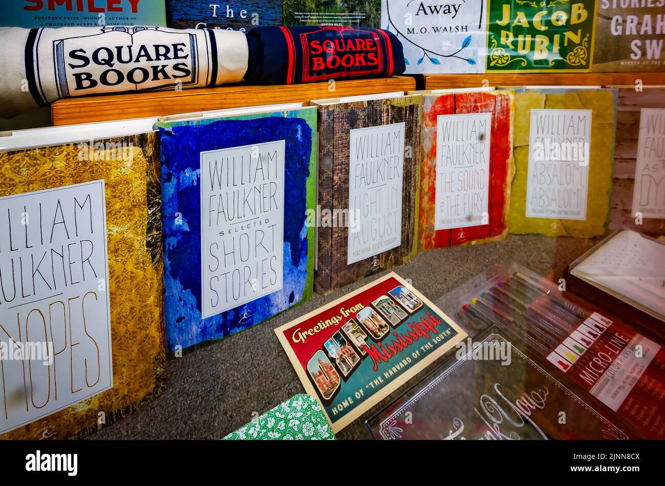 Books by William Faulkner and other Southern authors are displayed in the window at Square Books, May 31, 2015, in Oxford, Mississippi. Stock Photo