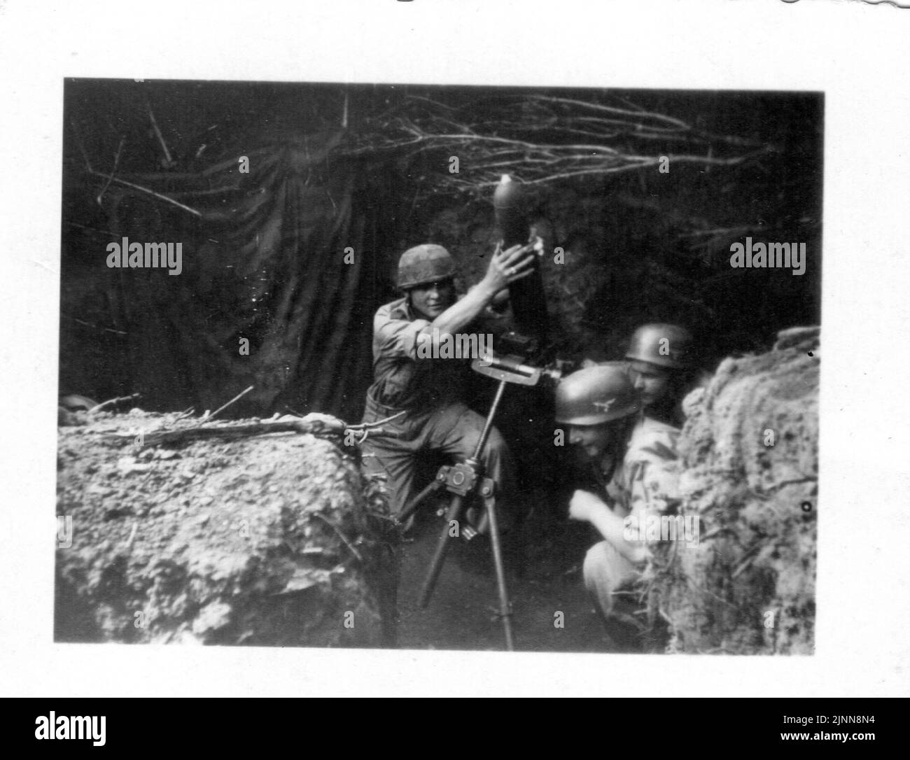 German Paratroops in World War Two Prepare to fire a Mortar in Italy in 1943 Stock Photo