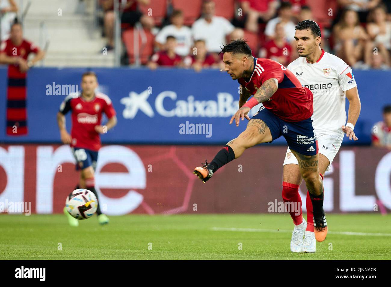 Pamplona, Spain. 11th May, 2021. The referee gives a yellow card to Budimir  during the Spanish La Liga Santander match between CA Osasuna and Cádiz CF  at the Sadar stadium.(Finale Score; CA