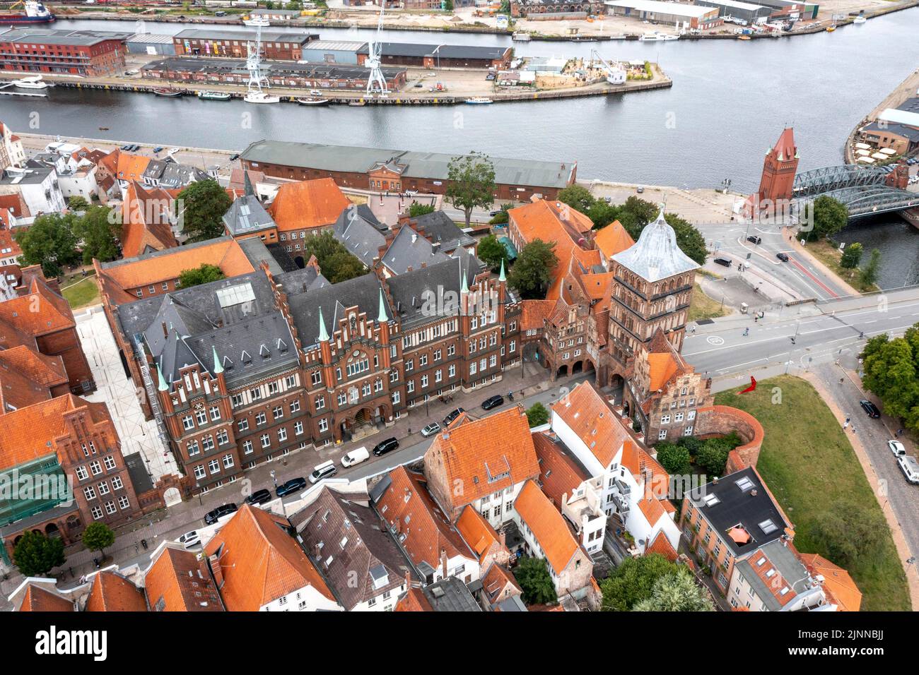Drone shot, drone photo, panorama photo, historical city centre of Luebeck with view of the castle with the castle gate, European Hanseatic Museum Stock Photo