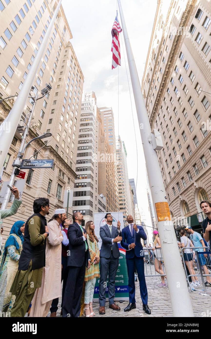 New York, NY - August 12. 2022: Mayor Eric Adams attends Pakistani flag raising along with American flag at Bowling Green Park Stock Photo