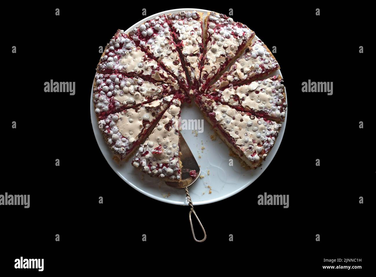 Fresh currant cake on a cake plate on a black background, Bavaria, Germany Stock Photo