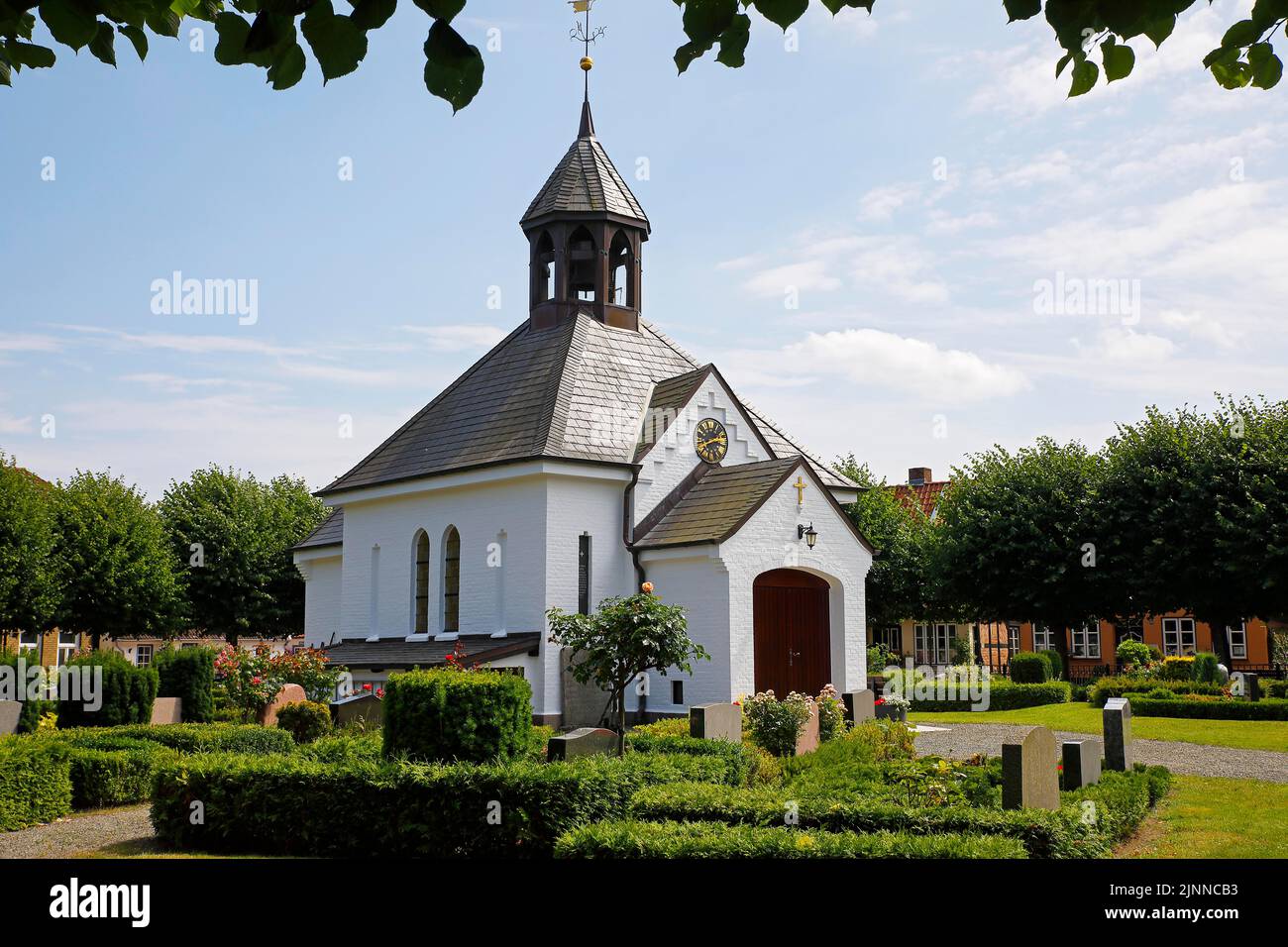 Cemetery chapel and cemetery, Historic fishing village Holm, Schleswig, Schleswig-Holstein, Germany Stock Photo