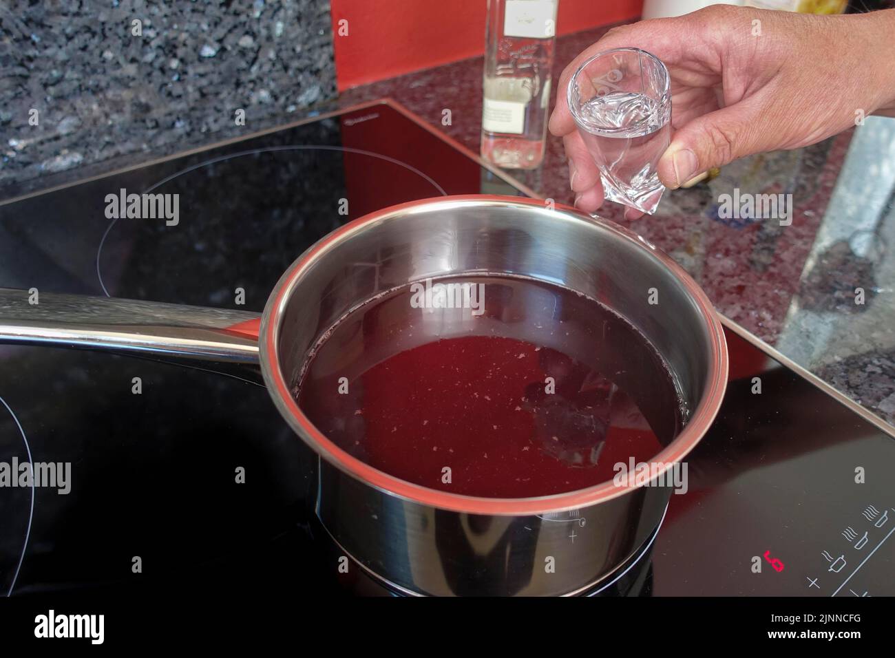 Swabian cuisine, preparing sweet semolina dumplings with cherry compote