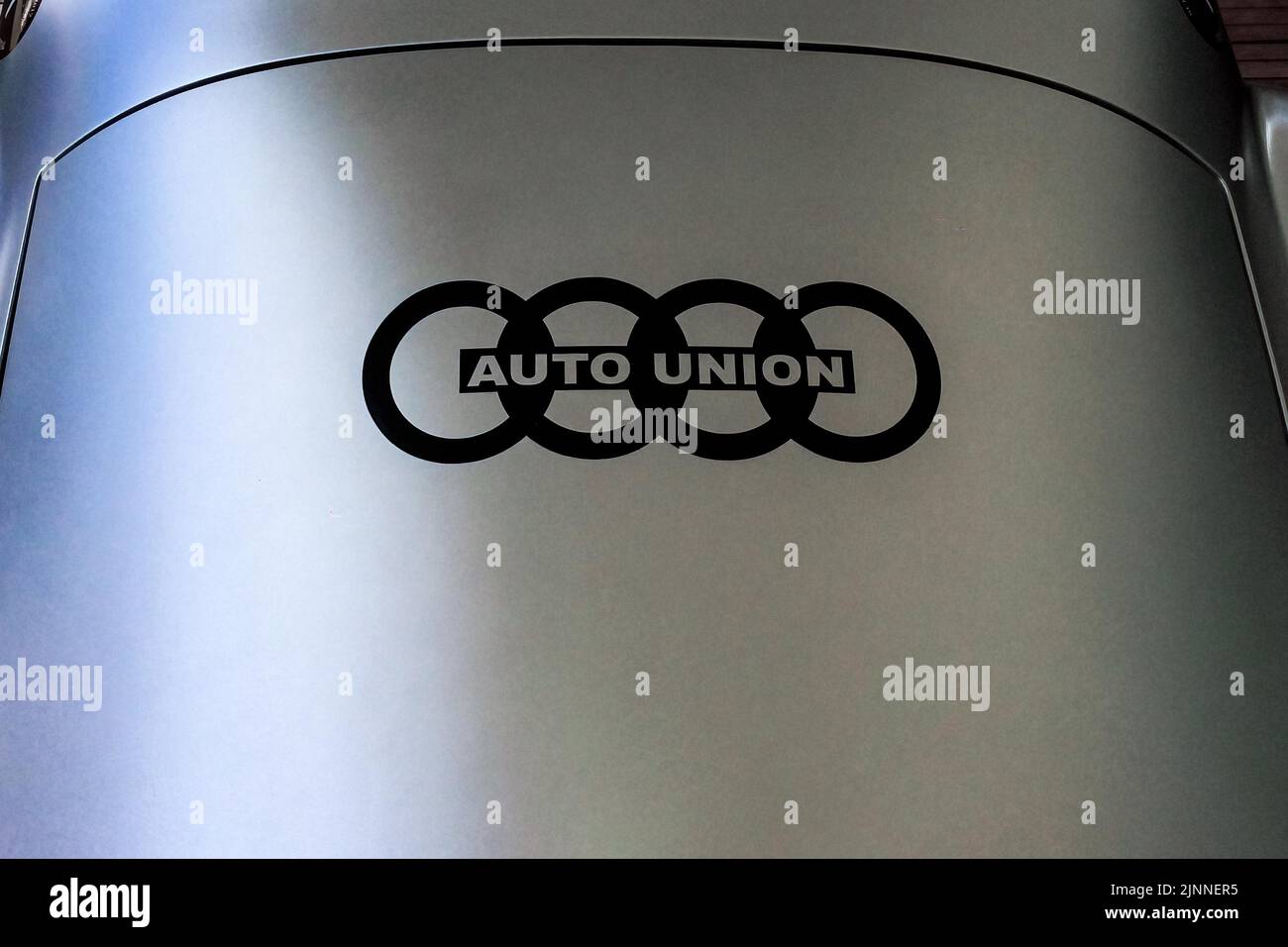 Historic logo of Auto Union with four rings of Audi on body of historic racing car sports car hiker Streamline Special, Classic Days, Schloss Dyck Stock Photo