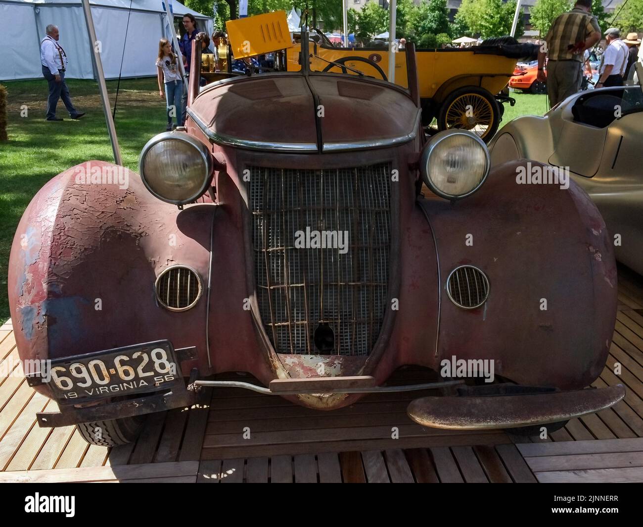 View of a rusty oldtimer in a forest, prior the vintage car auction in  Kaufdorf near Bern, Switzerland, Saturday, Sept. 19, 2009. Hundreds of  rusting vintage cars parked in an auto graveyard in the Swiss village of  Kaufdorf, south of Bern, are to be auctioned off