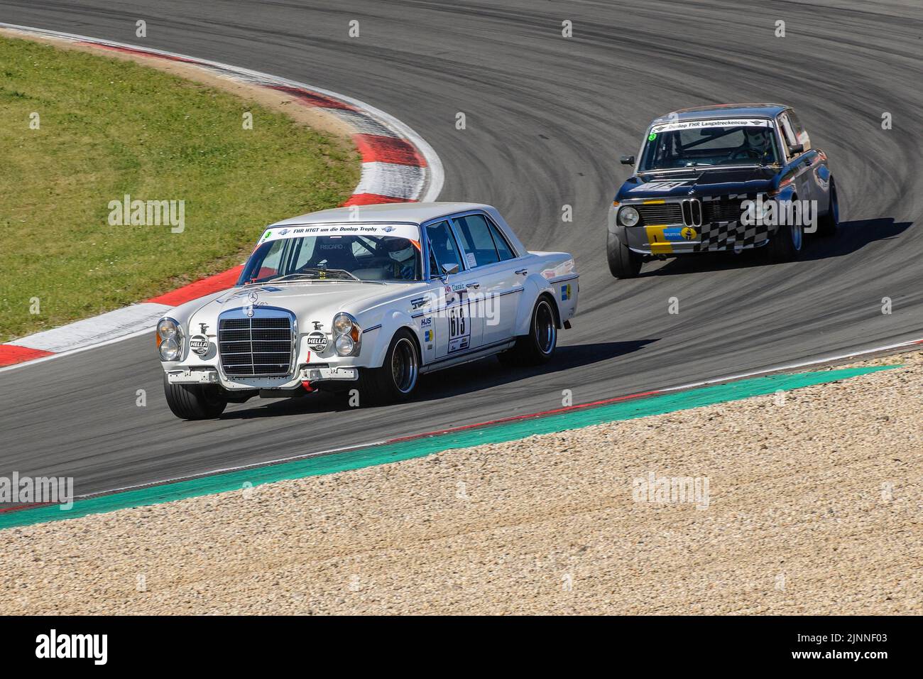 Historic race carDaimler-Benz 300 SEL 6, 3 behind BMW 2002 at car race for oldtimer youngtimer classic cars 24-hour race 24h race, Nuerburgring race Stock Photo
