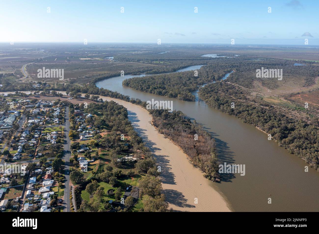 Muddy Flood waters from the Darling river merge with the mighty Murray