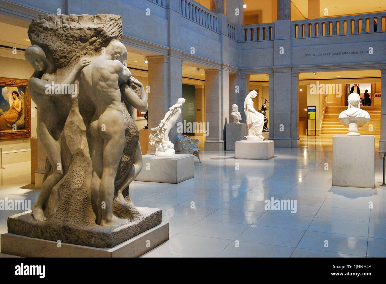 Ancient Roman and Greek sculptures stand in the main gallery inthe atrium of the Art Instituter of Chicago Stock Photo