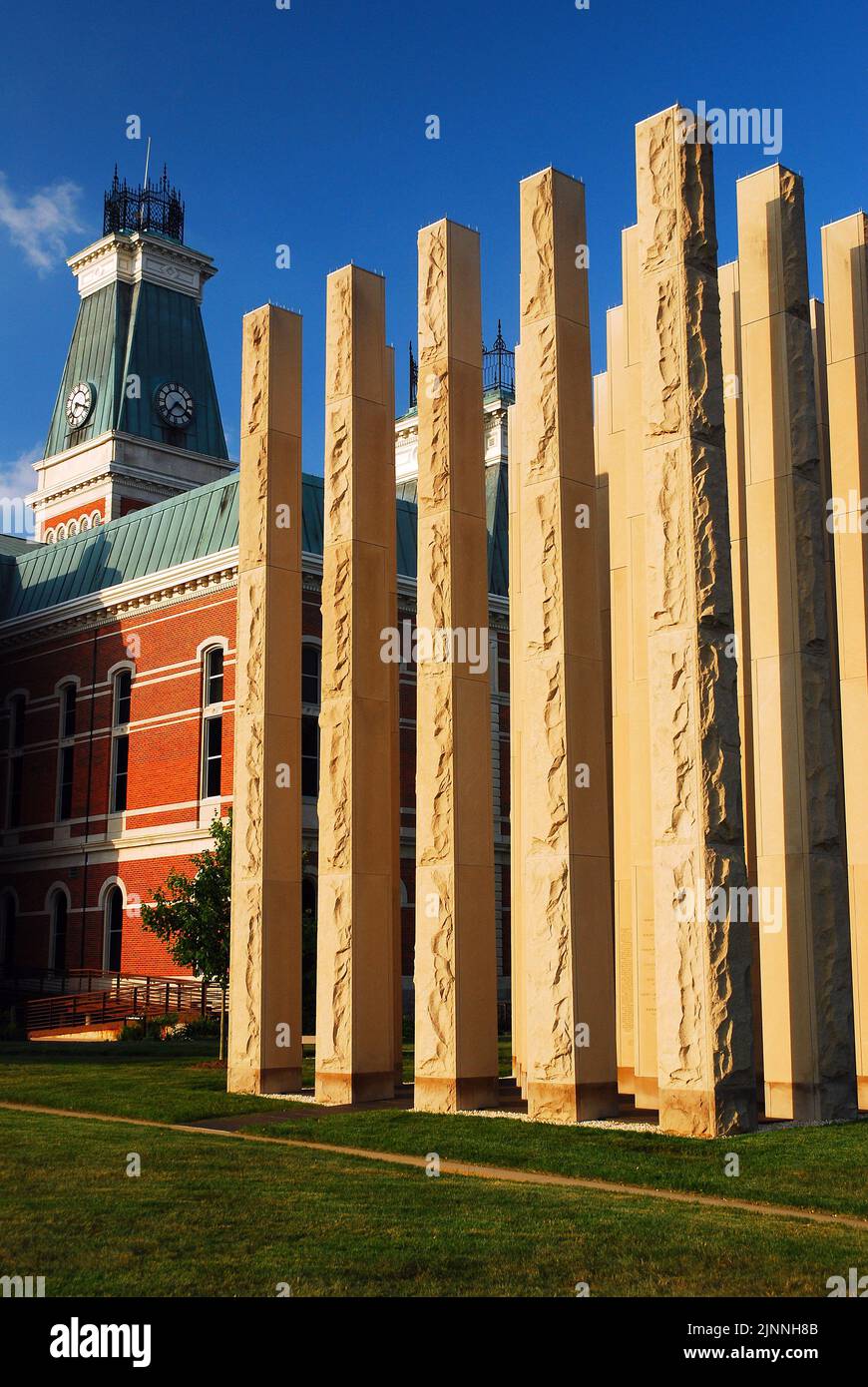 Stone pillars on the grounds of the Bartholomew County Courthouse in Columbus, Indiana honors the veterans killed in action Stock Photo