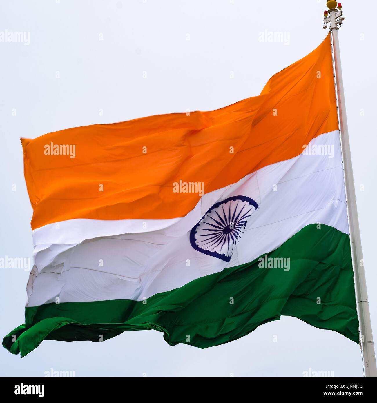 India flag flying high at Connaught Place with pride in blue sky, India ...