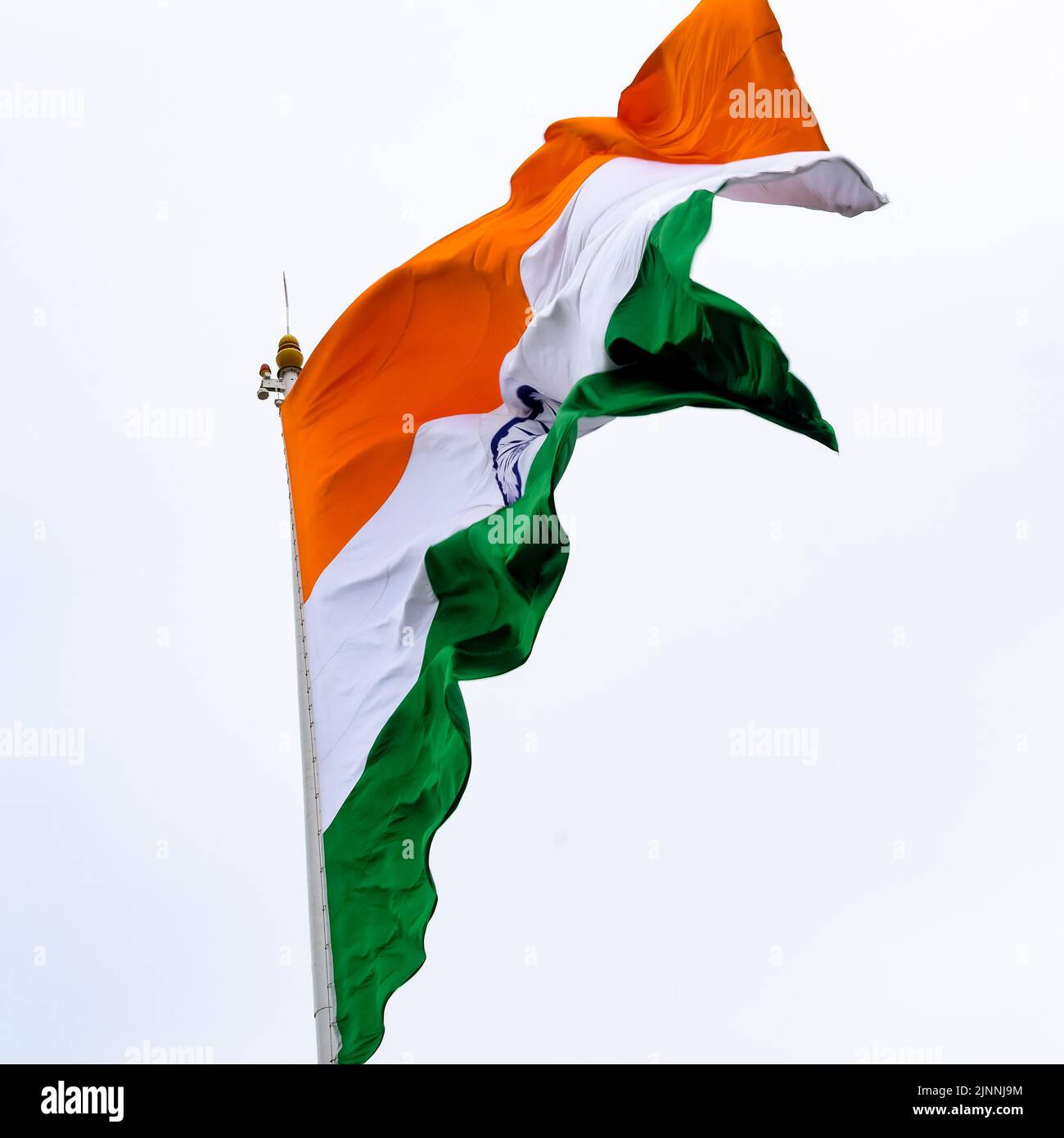 India flag flying high at Connaught Place with pride in blue sky, India ...