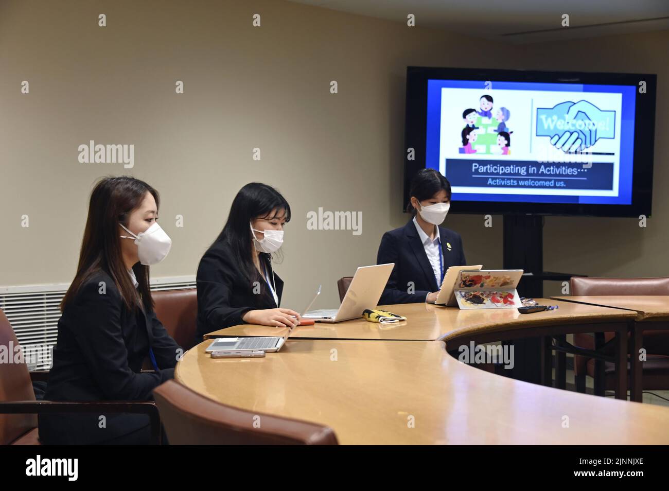 A group of students from Japan's Nagasaki University attend a peace forum at U.N. headquarters in New York on Aug. 12, 2022, as a review conference of the Treaty on the Non-Proliferation of Nuclear Weapons is under way. (Kyodo)==Kyodo Photo via Credit: Newscom/Alamy Live News Stock Photo