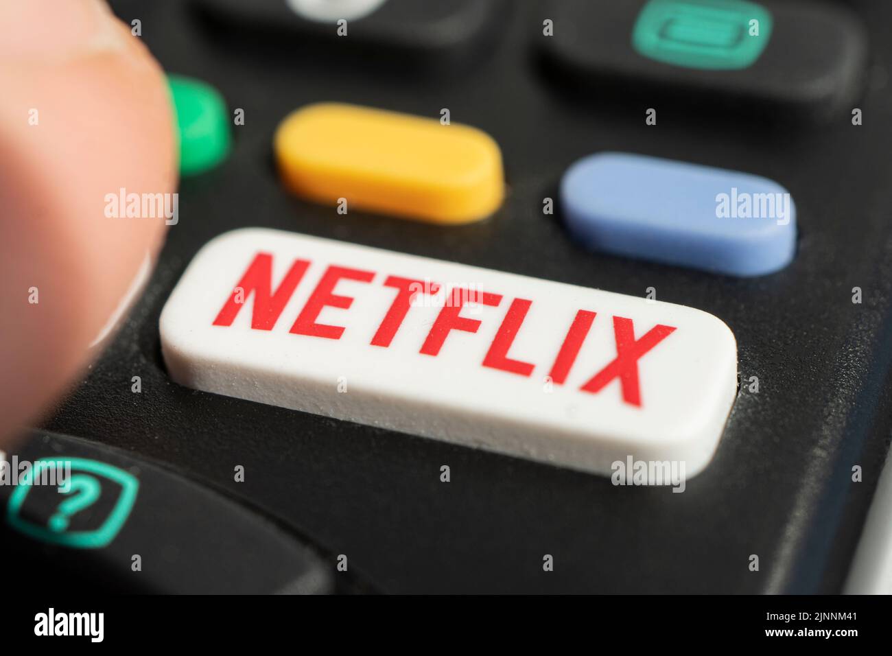 Barnaul russia, May 15, 2022 using a television remote with a