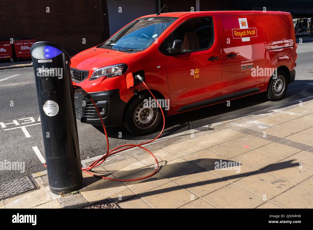 12 August 2022: Royal Mail delivery van at electric charging station, London, UK Stock Photo