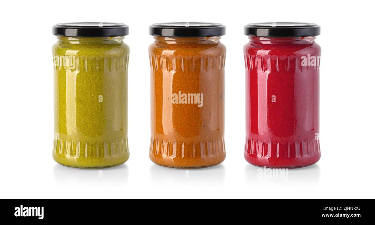 bbq sauce in glass jar isolated on white background with clipping path