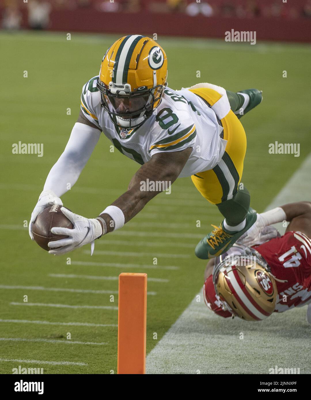 Santa Clara, USA. 13th Aug, 2022. Green Bay Packers wide receiver Amari Rodgers (8) dives for a fourth quarter TD with a pass from quaqrterback Danny Etling against the San Francisco 49ers at Levi's Stadium in Santa Clara, California on Friday, August 12, 2022. The 49ers defeated the Packers 28-21 in their first preseason game Photo by Terry Schmitt/UPI Credit: UPI/Alamy Live News Stock Photo