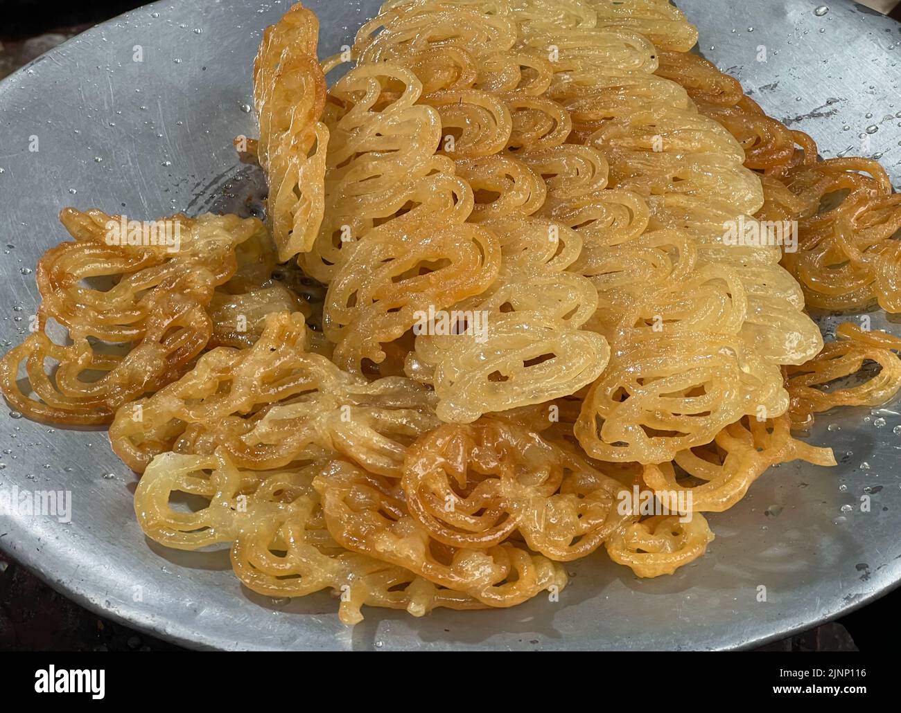 View of sweet dish gulati freshly baked on shop. food concept. Stock Photo