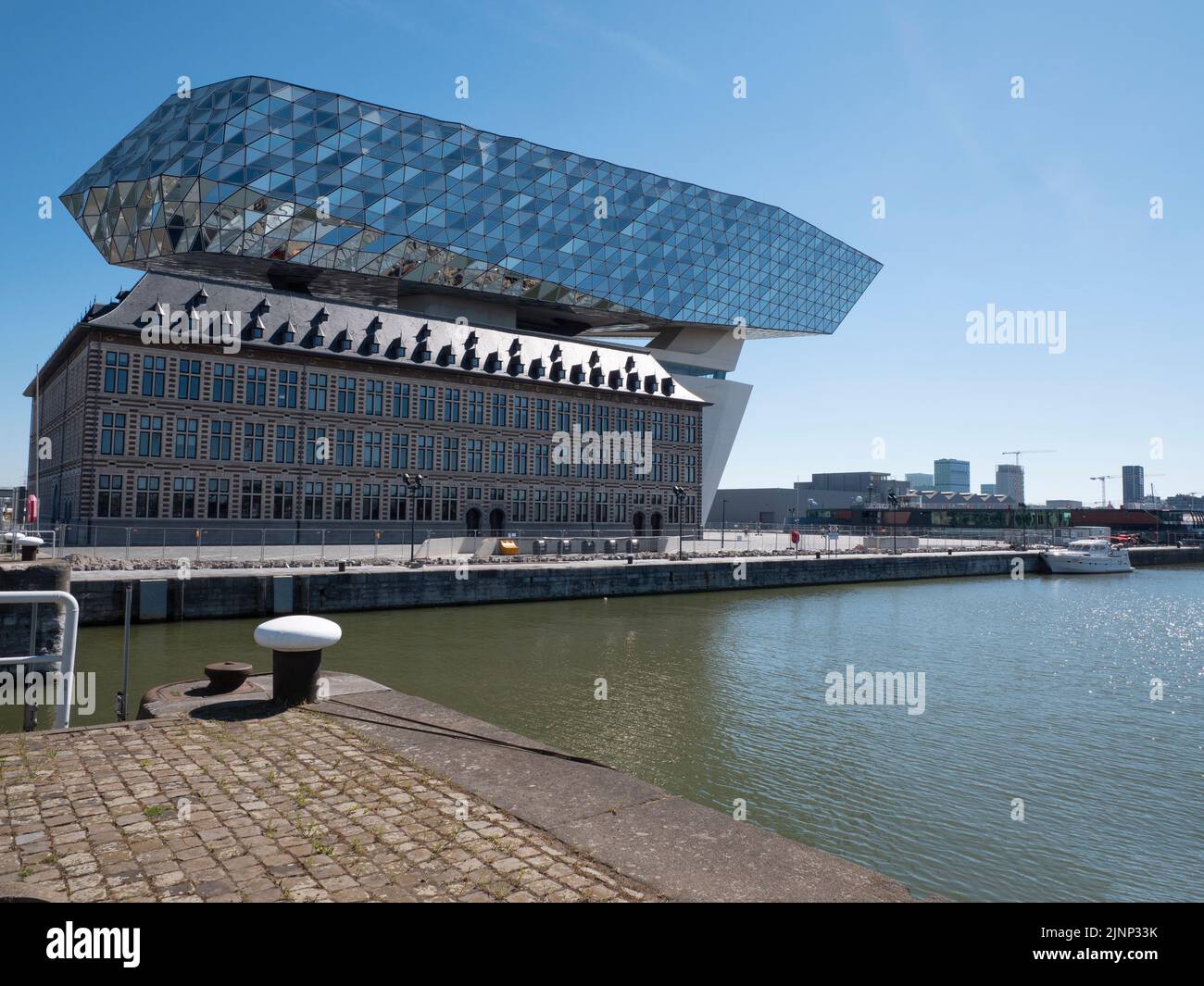Antwerp, Belgium, April 17, 2022, The Port House is a building on the Antwerp Island by the British-Iraqi architect Zaha Hadid Stock Photo