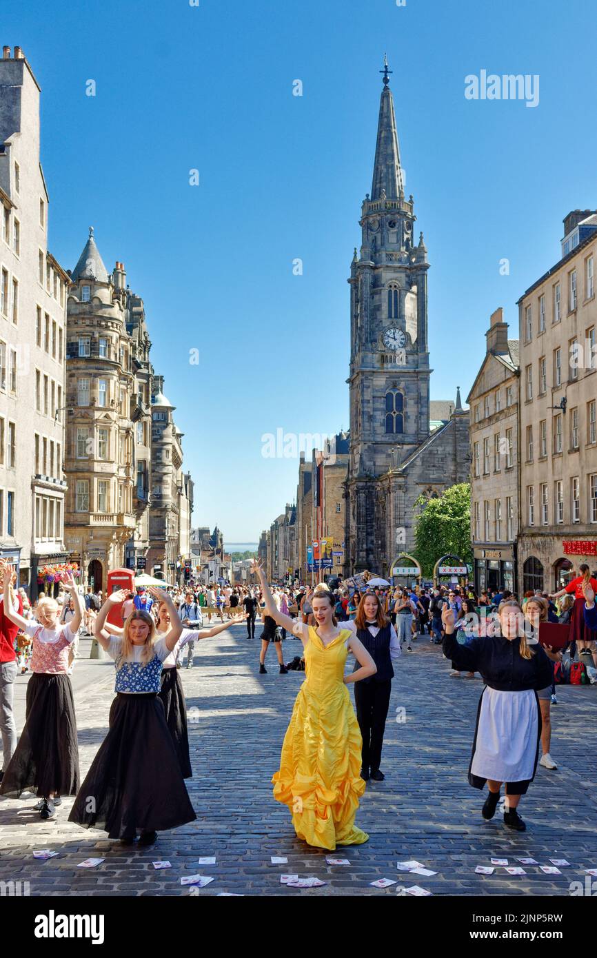 Edinburgh, Scotland, August 11, 2022 Festival Fringe  in the Royal Mile singers and dancers perform from the play Beauty and the Beast Stock Photo