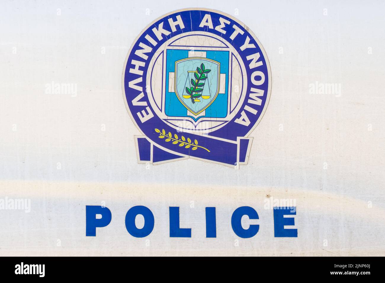 Nafplio, Greece, July 19, 2022. Greek poilice sign on a car on a street