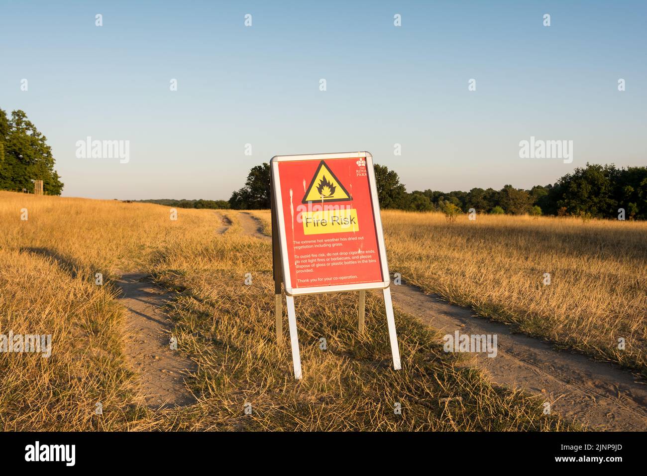 London, England, UK. 12 August 2022.  A Fire Risk sign during a drought in a scorched Richmond Park. © Benjamin John Stock Photo