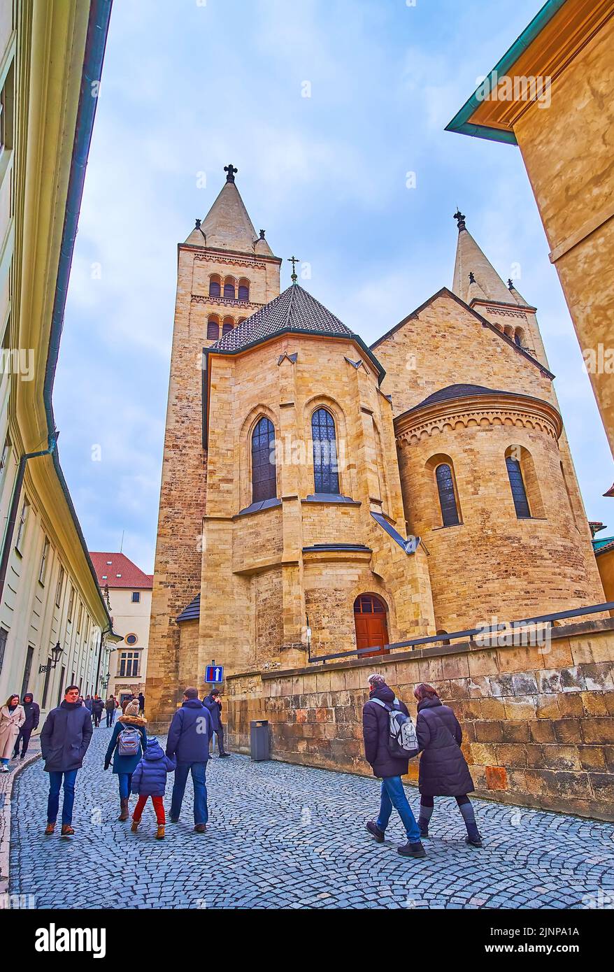 PRAGUE, CAZECH REPUBLIC - MARCH 6, 2022: The narrow curved Jirska Street with a view on the apse of St George Basilica, on March 6 in Prague Stock Photo
