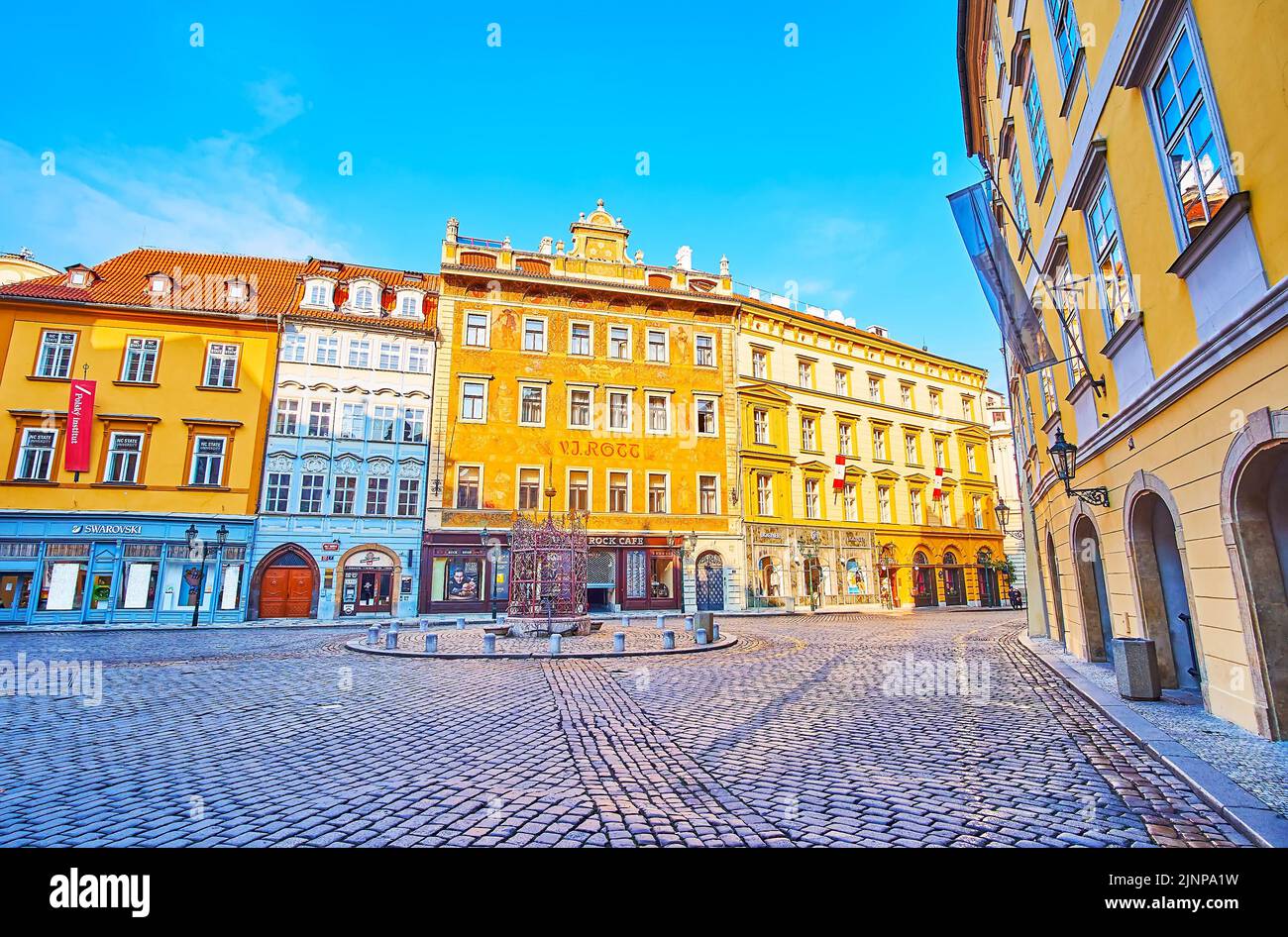 PRAGUE, CZECH REPUBLIC - MARCH 6, 2022: The beautiful mansions and frescoed U Rotta House on Little Square of Stare Mesto (Old Town) district, on Marc Stock Photo