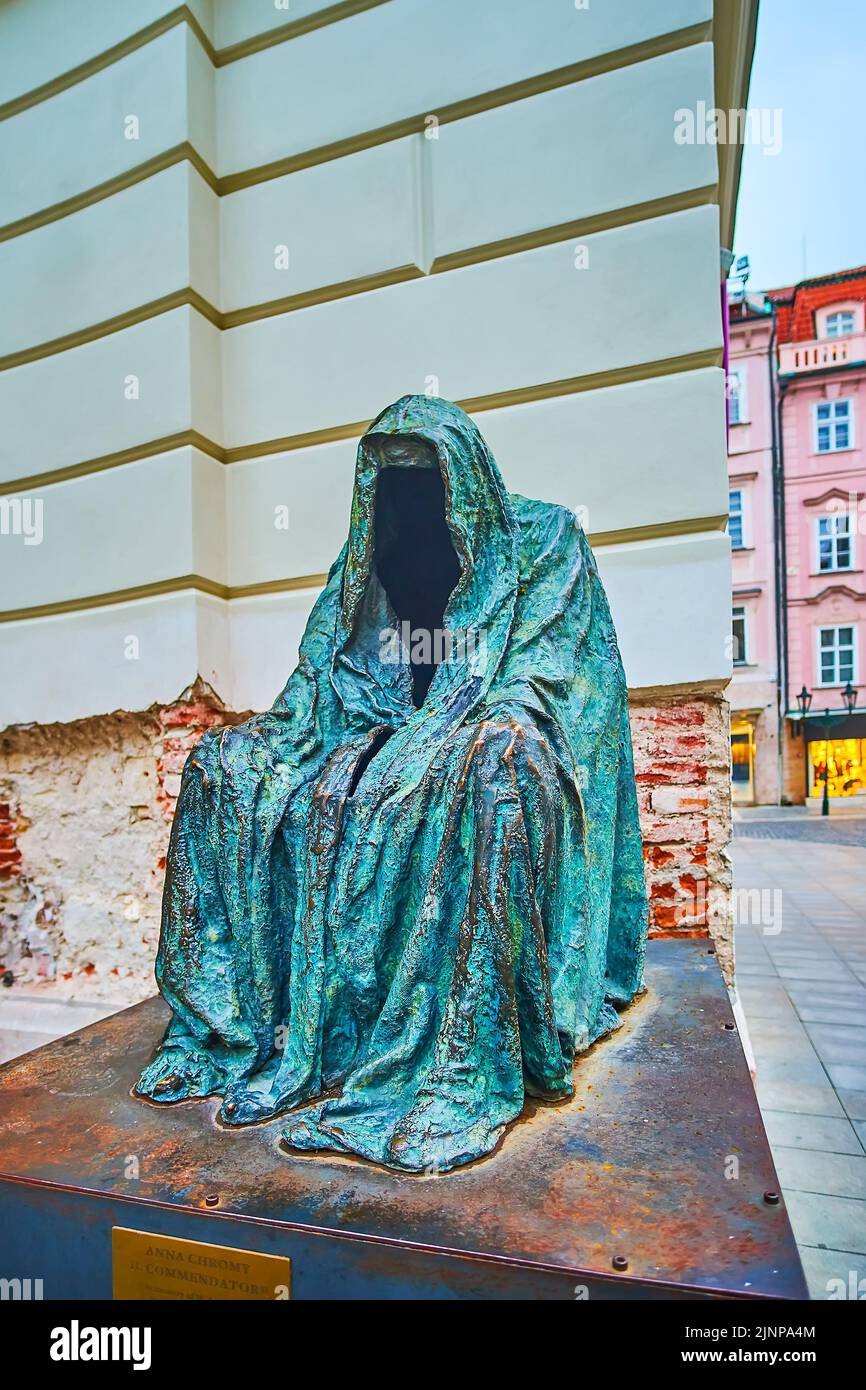 PRAGUE, CZECH REPUBLIC - MARCH 6, 2022: The bronze Il Commendatore (Cloak of Conscience) statue by Anna Chromy on the Fruit Market Square, on March 6 Stock Photo
