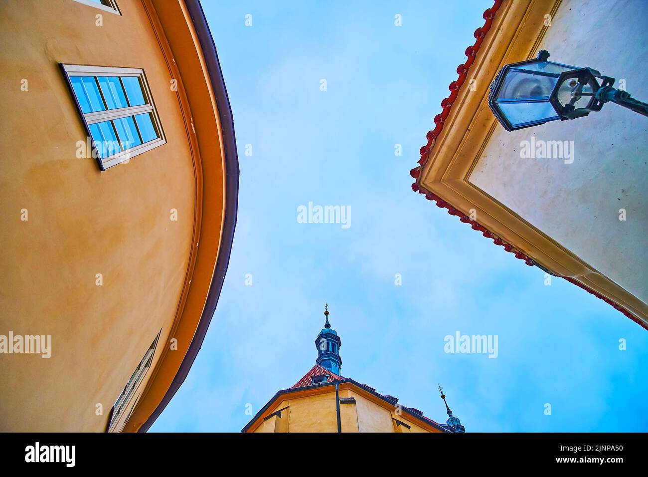 The view on the narrow gap between historic houses in Old Town of Prague, Czech Republic Stock Photo