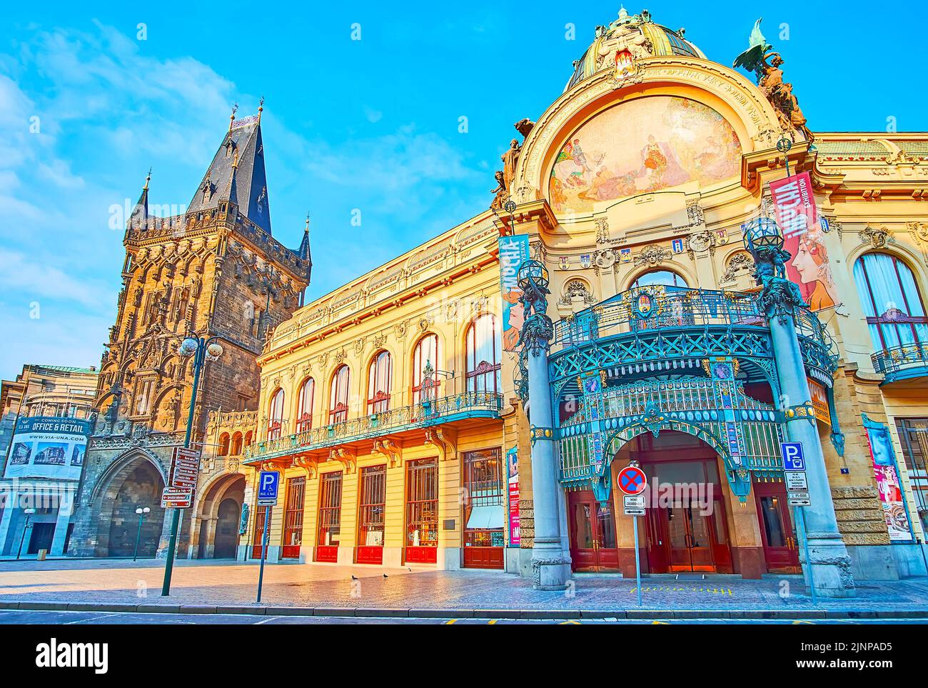 Historic landmarks of Republic Square - Gothic Powder Tower and Smetana Hall, decorated with sculptures, columns and mosaics, Prague, Czech Republic Stock Photo