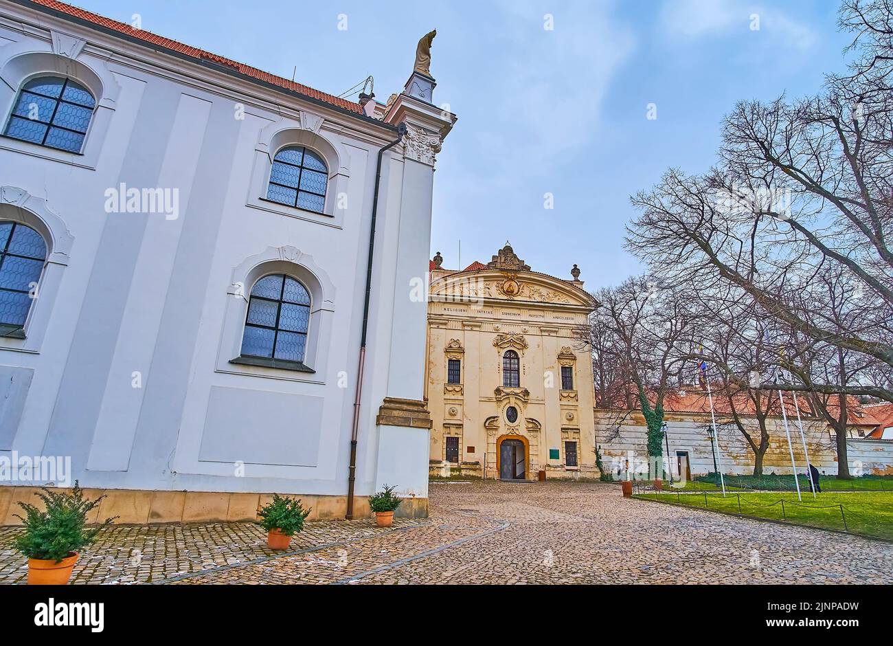 The scenic Baroque facade of the Library of Strahov Monastery, seen from Strahovske Nadvori courtyard, Hradcany, Prague, Czech Republic Stock Photo