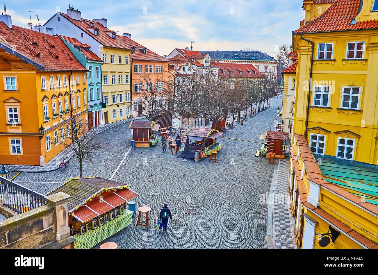 The small wooden fair stalls on pedestrian Na Kampe Street, lined with old houses of different colors, Mala Strana (Lesser Quarter), Prague, Czech Rep Stock Photo