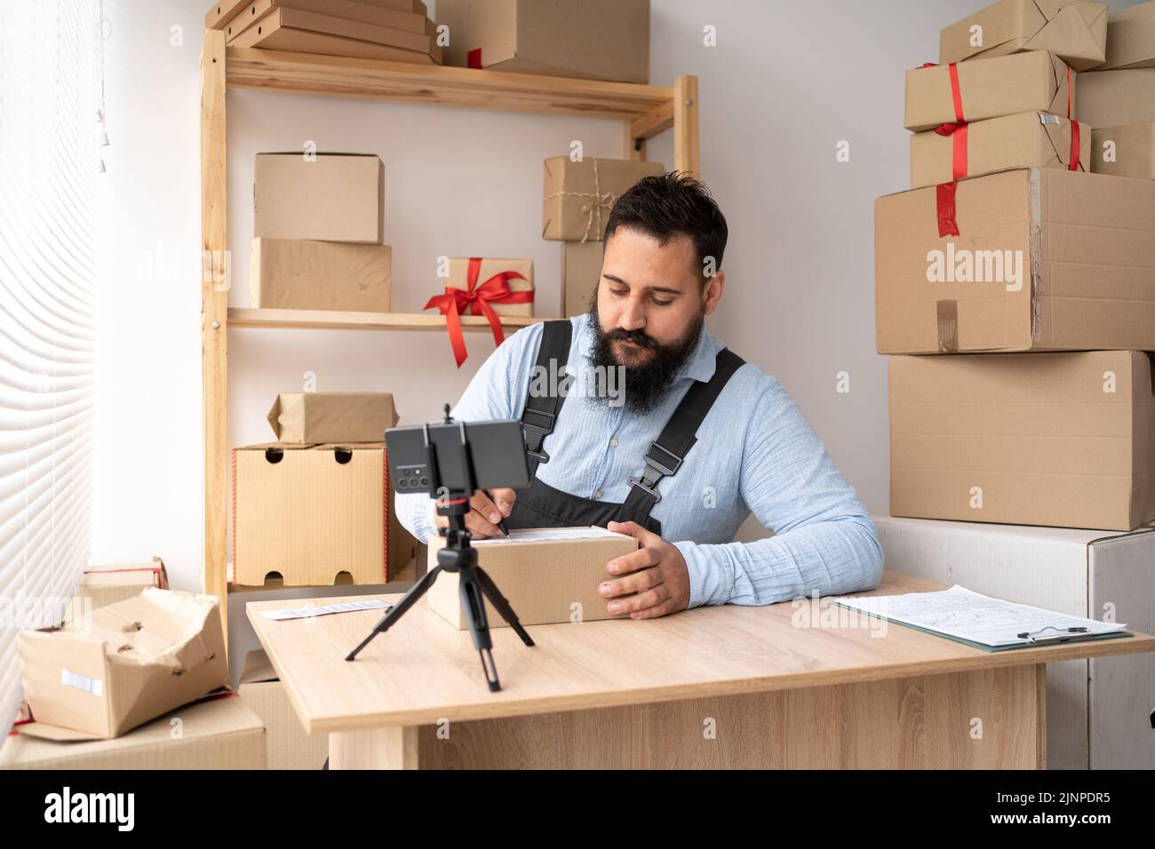 Startup indian man entrepreneur happy after new order from customer