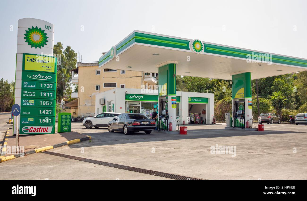 Corfu, Greece - August 03, 2021: Driver refuel cars at BP gas station. British Petroleum Company is an oil and gas company headquartered in London, En Stock Photo