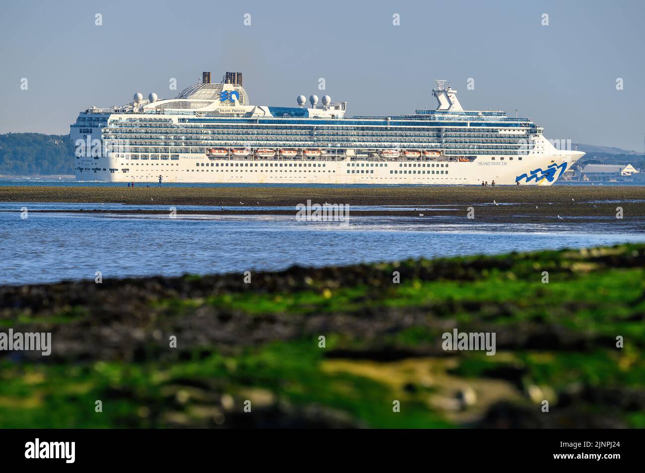 Island Princess is a Coral class cruise ship operated by Princess Cruises - August 2022. Stock Photo