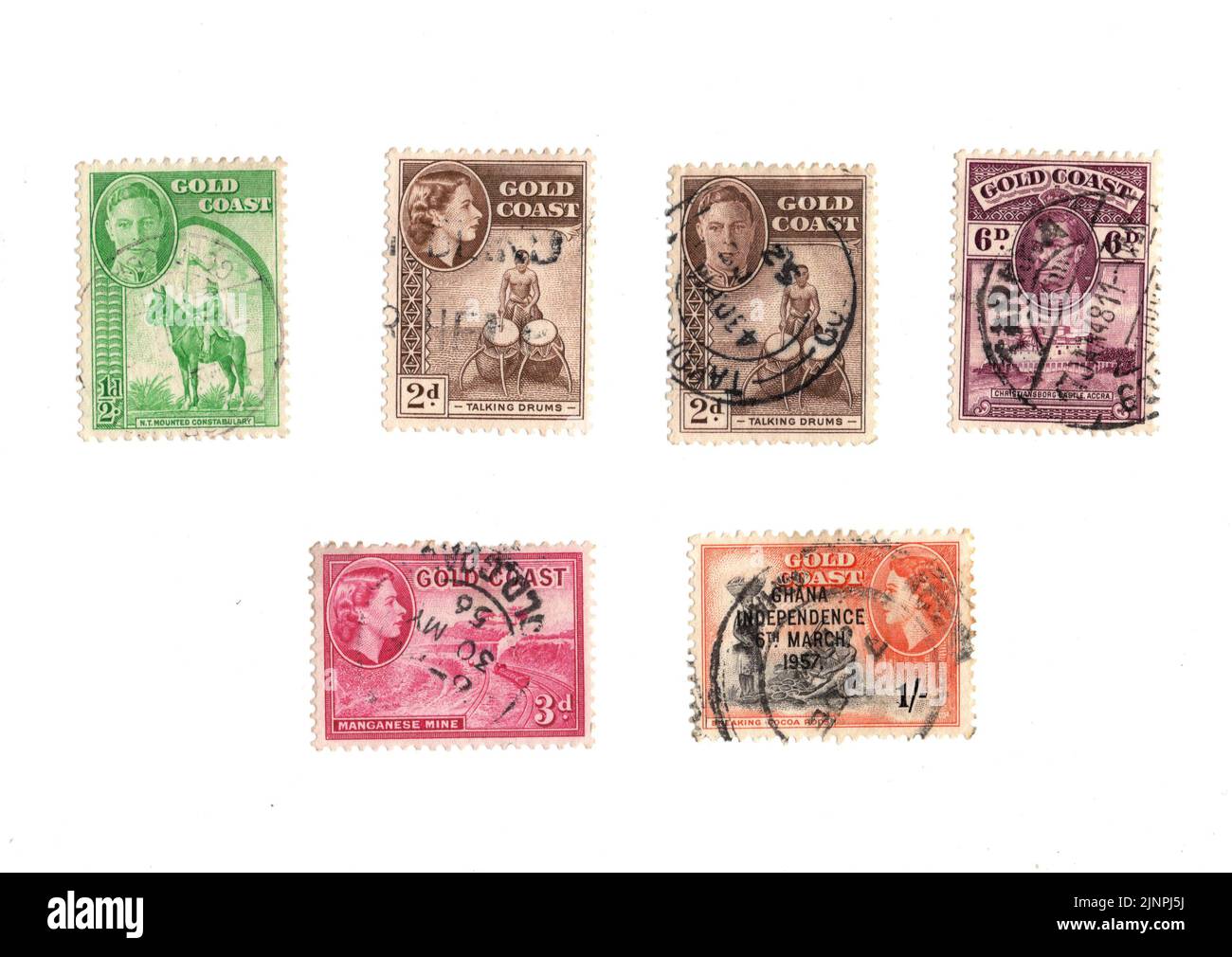 A selection of old postage stamps from Gold Coast on a white background ...