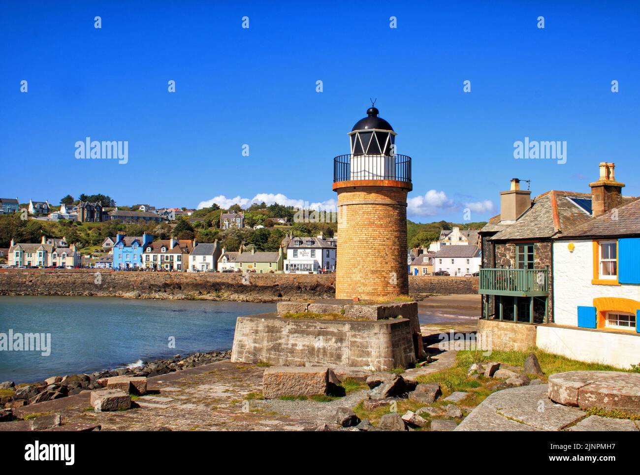 The lighthouse and harbour at Portpatrick, Stranraer, Scotland Stock Photo