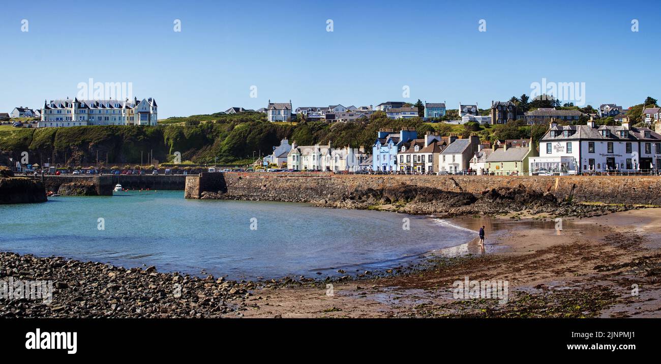 Portpatrick Harbour, Stranraer, Scotland. With the Portpatrick Hotel in the distance on the left of the cliff Stock Photo