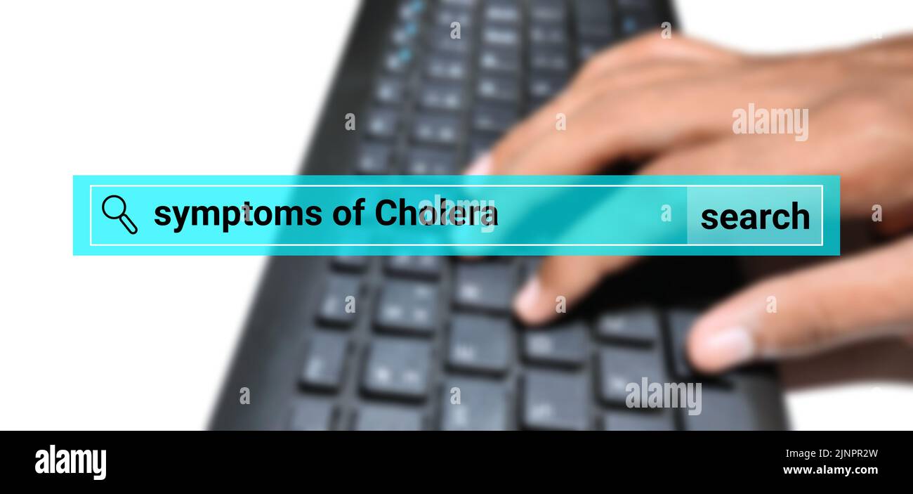 Pearson search about cholera disease illustration with blur keyboard and hand. digital health care concept. Stock Photo