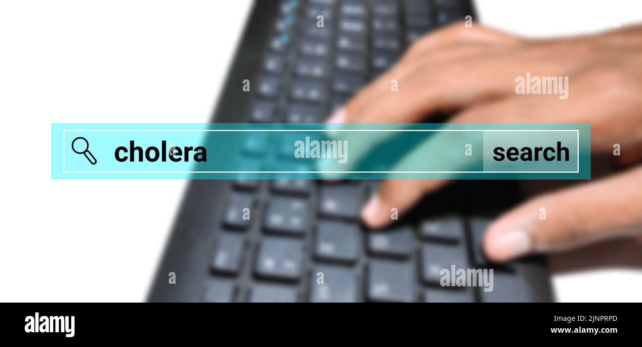 Pearson search about cholera disease illustration with blur keyboard and hand. digital health care concept. Stock Photo