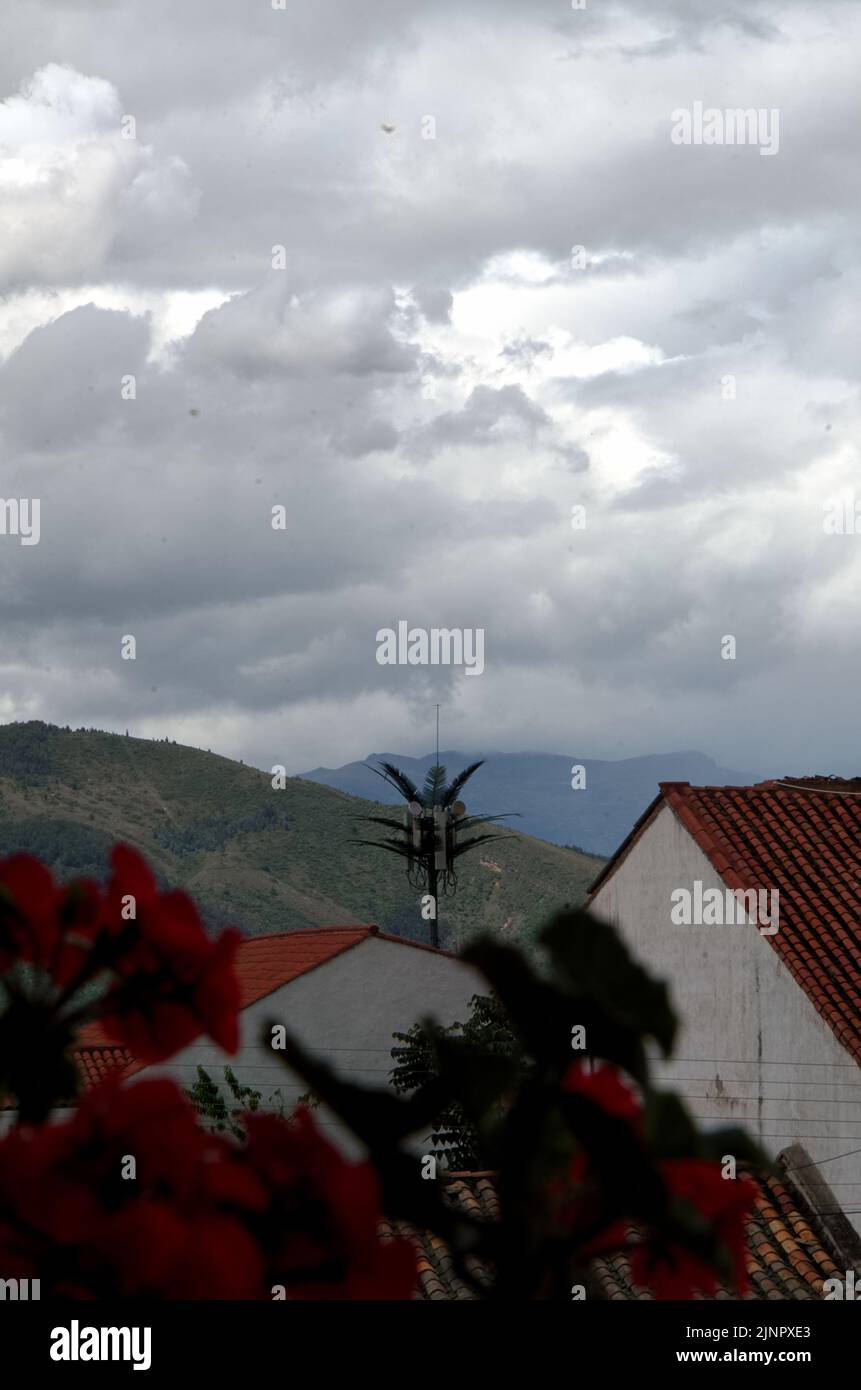 Roof tops with mountains in the back Stock Photo