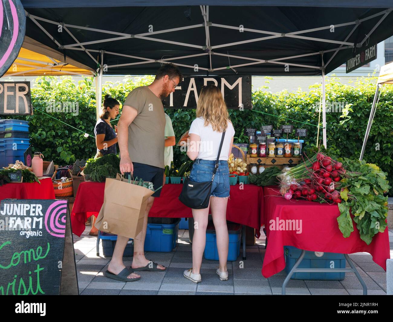 Scenes from the Farmer's Market at Lansdowne Place. Organic farm produce tent. Ottawa, ON, Canada. Stock Photo