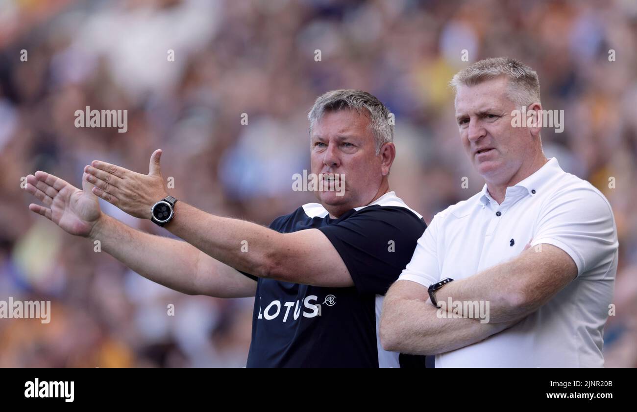 Norwich City manager Dean Smith and assistant Craig Shakespeare (left) during the Sky Bet Championship match at the MKM Stadium, Hull. Picture date: Saturday August 13, 2022. Stock Photo