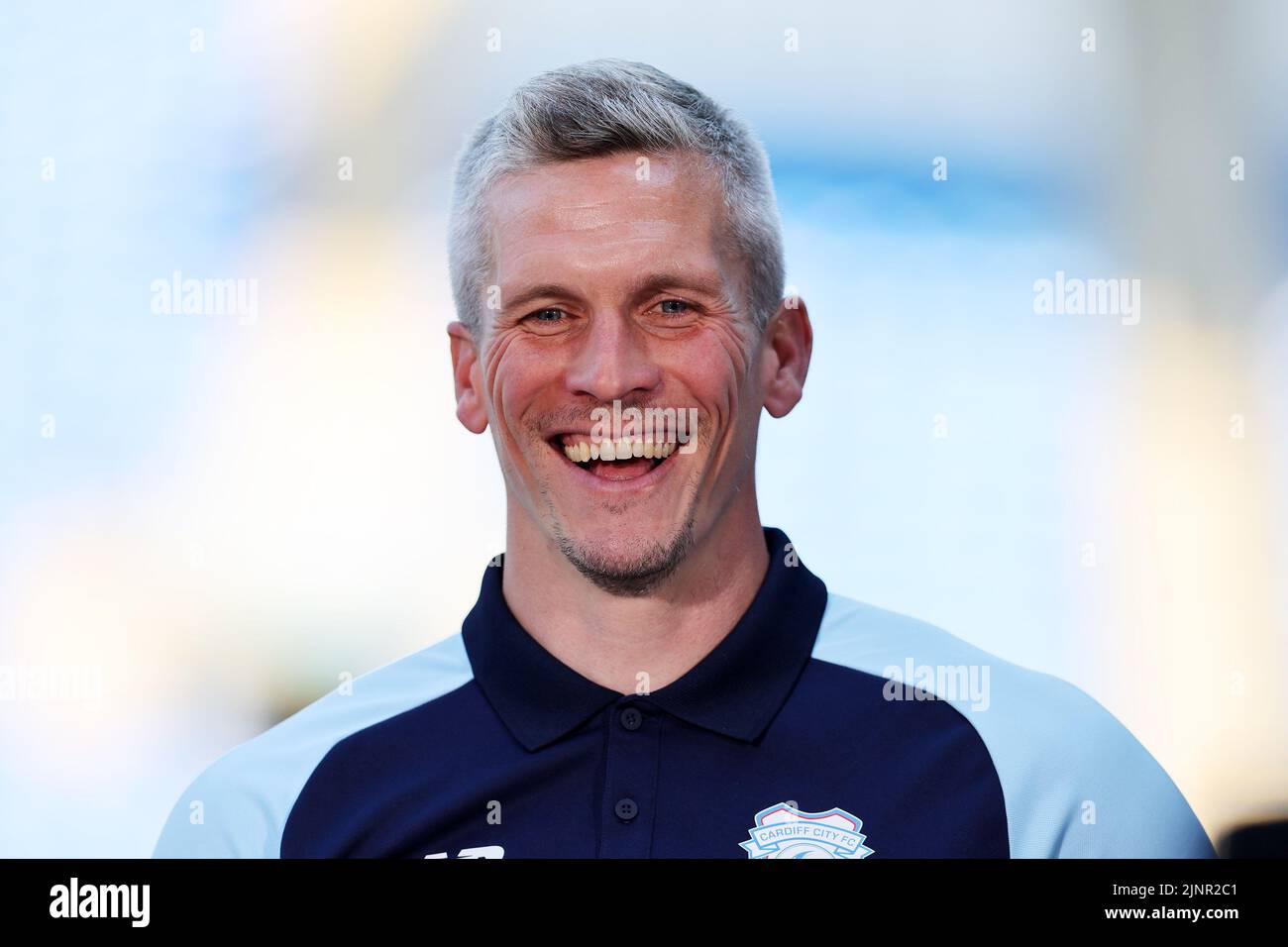 Cardiff, UK. 13th Aug, 2022. Steve Morison, the manager of Cardiff city looks on smiling after the win. EFL Skybet championship match, Cardiff city v Birmingham City at the Cardiff City Stadium in Cardiff, Wales on Saturday 13th August 2022. this image may only be used for Editorial purposes. Editorial use only, license required for commercial use. No use in betting, games or a single club/league/player publications. pic by Andrew Orchard/Andrew Orchard sports photography/Alamy Live news Credit: Andrew Orchard sports photography/Alamy Live News Stock Photo