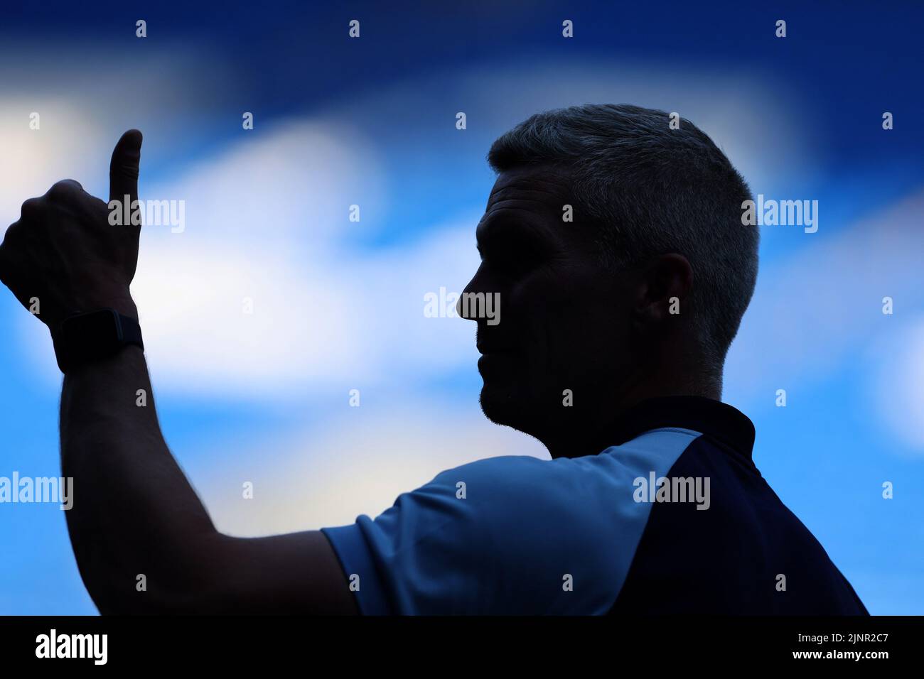 Cardiff, UK. 13th Aug, 2022. A silhouette of Steve Morison, the manager of Cardiff city giving thumbs up signal. EFL Skybet championship match, Cardiff city v Birmingham City at the Cardiff City Stadium in Cardiff, Wales on Saturday 13th August 2022. this image may only be used for Editorial purposes. Editorial use only, license required for commercial use. No use in betting, games or a single club/league/player publications. pic by Andrew Orchard/Andrew Orchard sports photography/Alamy Live news Credit: Andrew Orchard sports photography/Alamy Live News Stock Photo