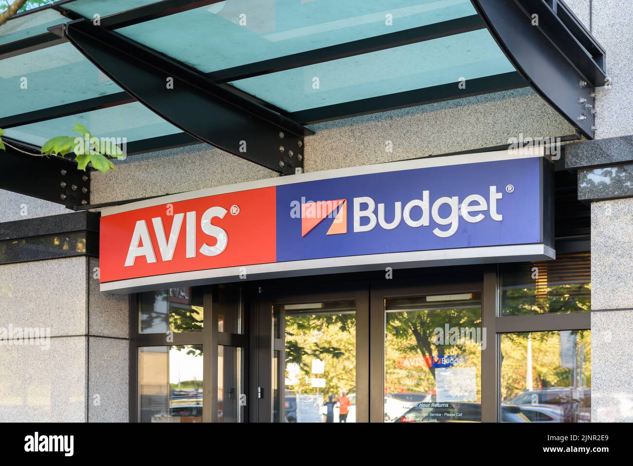 Seattle - August 07, 2022; Sign for an Avis Budget Group location in Seattle Stock Photo