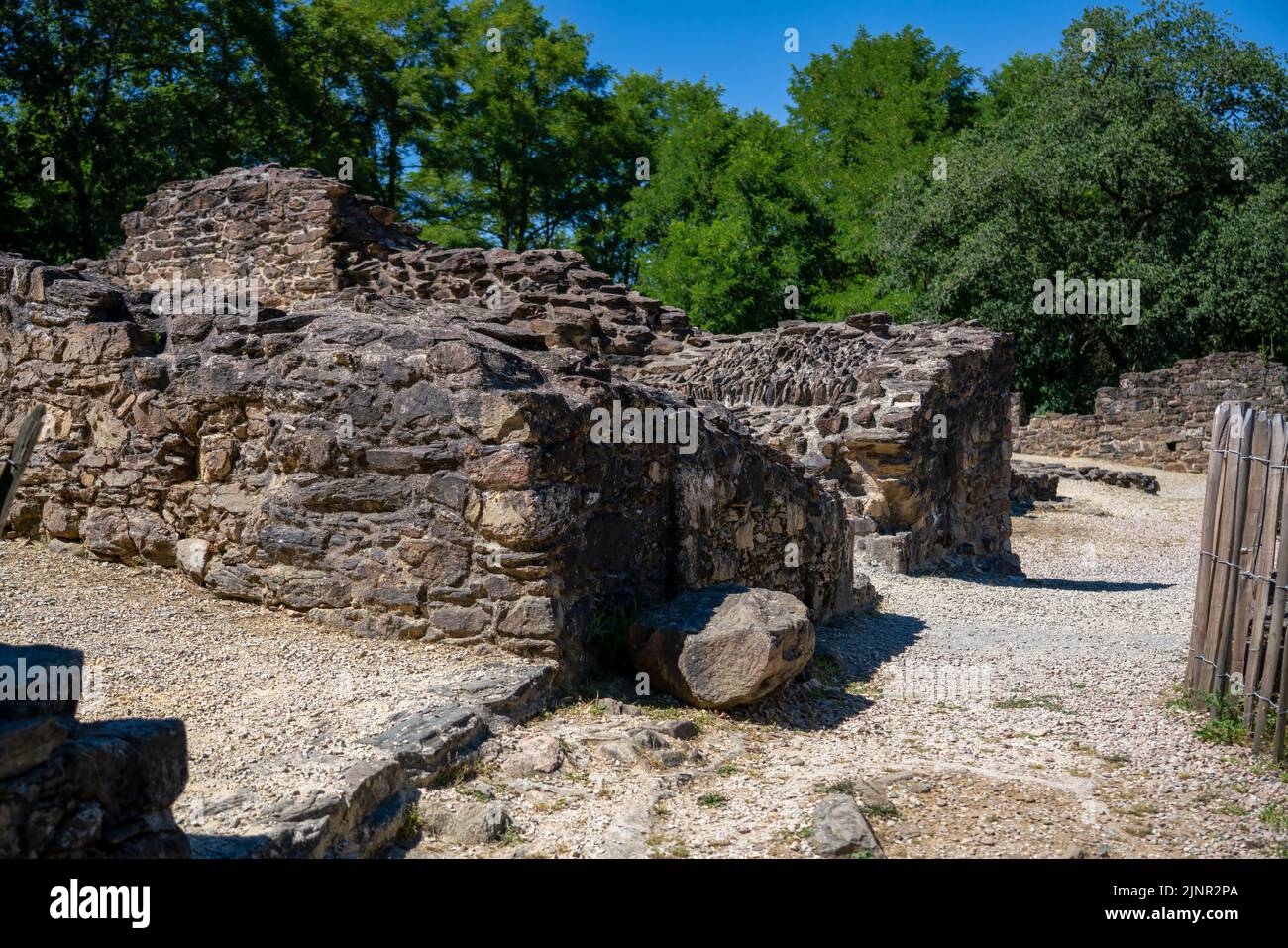 stone-built buildings and structures in a Roman village, Le Bas Castrum, Chalucet Castle, near Limoges France Stock Photo