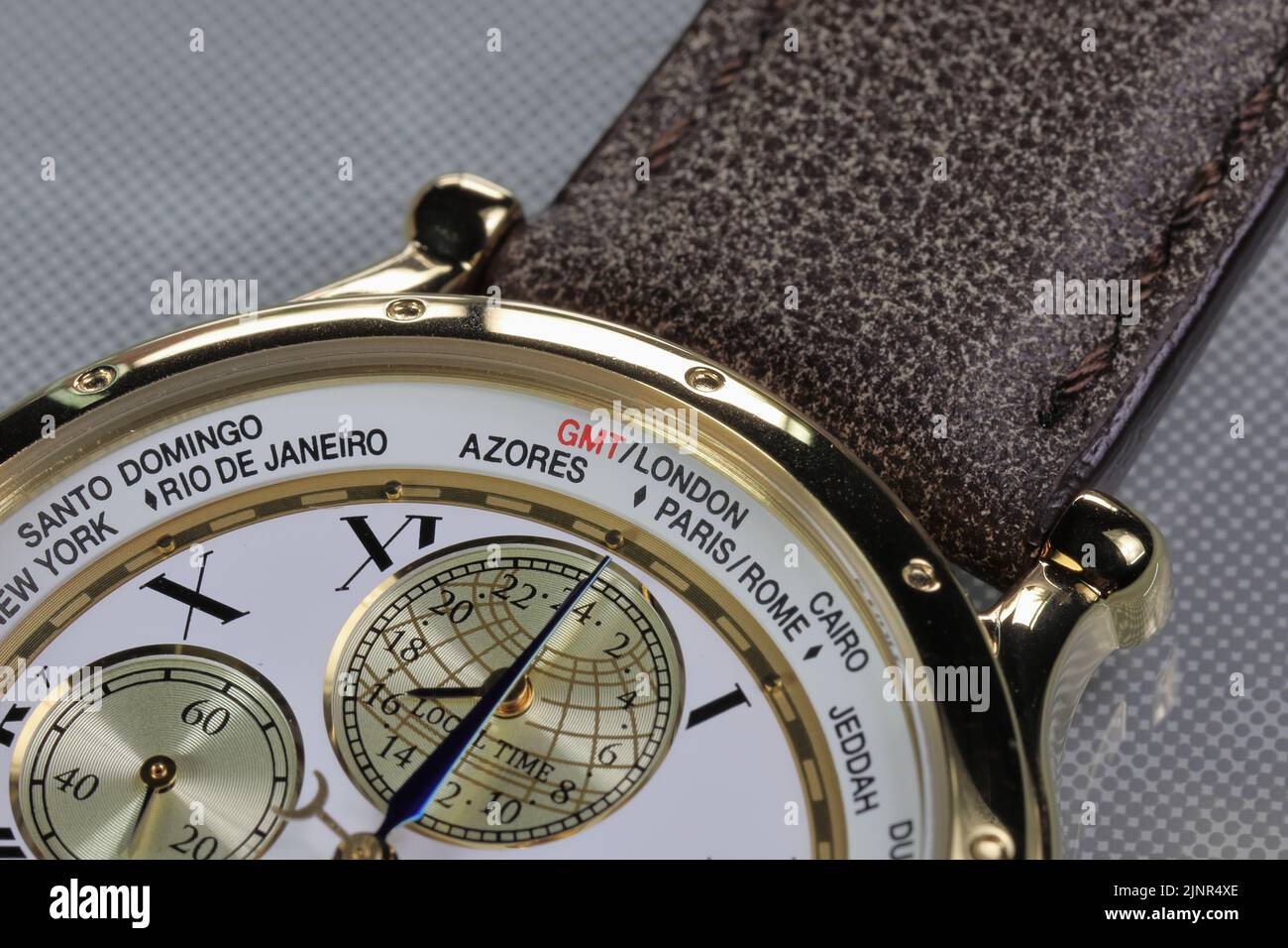 close up on Time zone cities name on luxury world time watch bezel on
