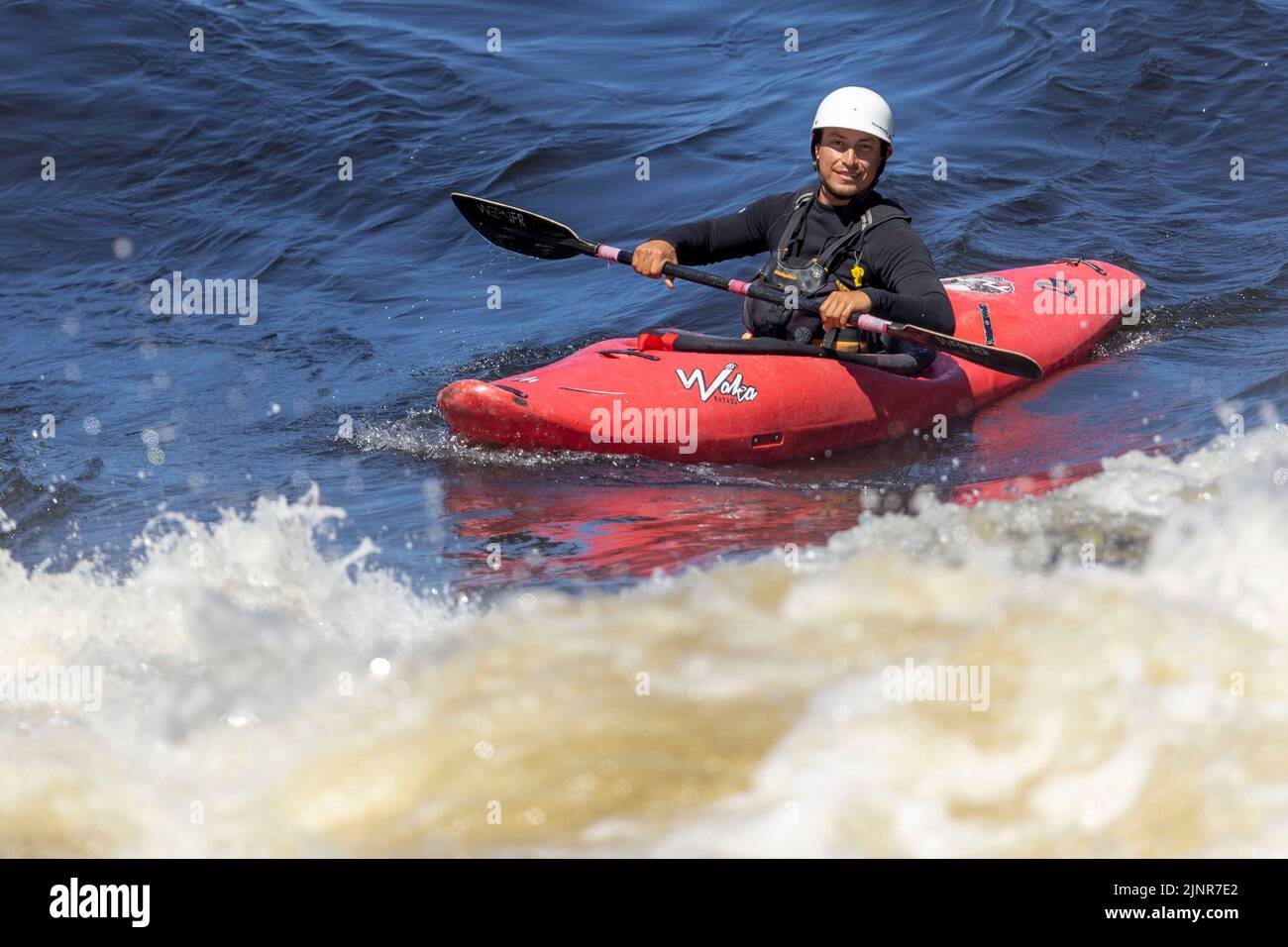 (Ottawa River near Cobden, Canada12 August 2022) Paddlers working